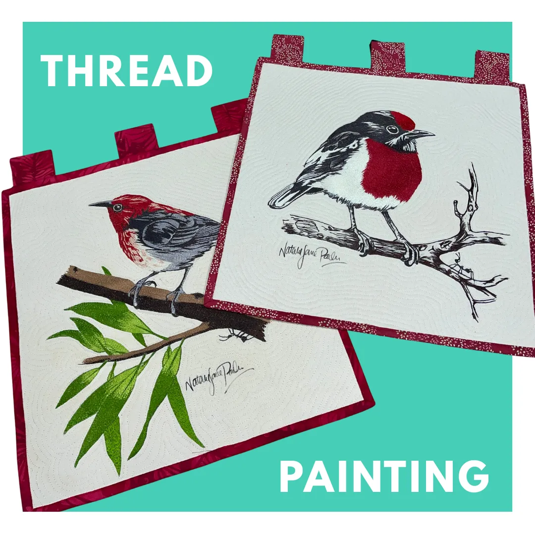 Colorful whimsical quilt with triangular circus tents, toys, and geometric shapes on a pink background bordered with colorful triangles and diamonds. No human shapes or faces.