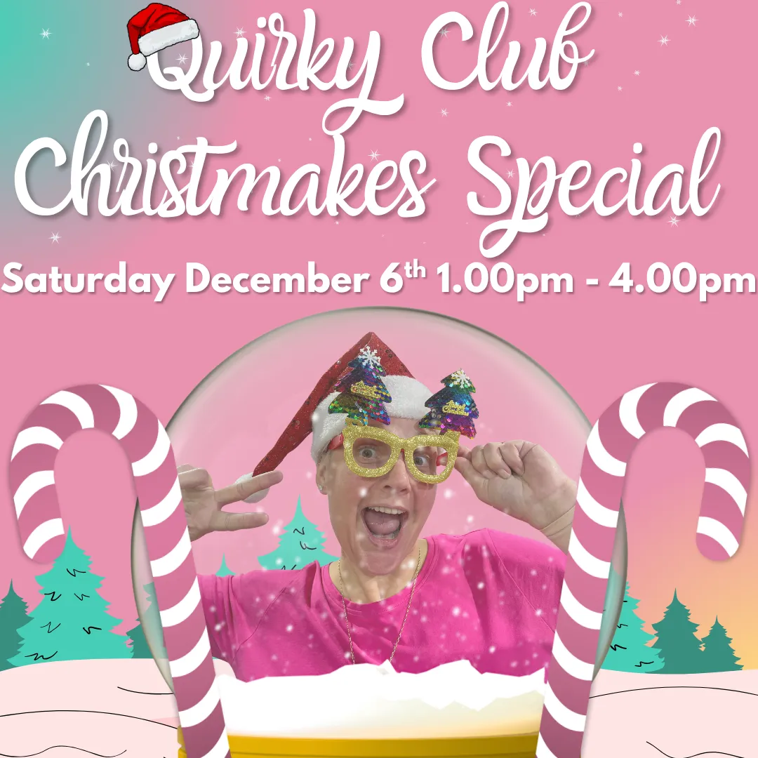 Colorful whimsical quilt with triangular circus tents, toys, and geometric shapes on a pink background bordered with colorful triangles and diamonds. No human shapes or faces.