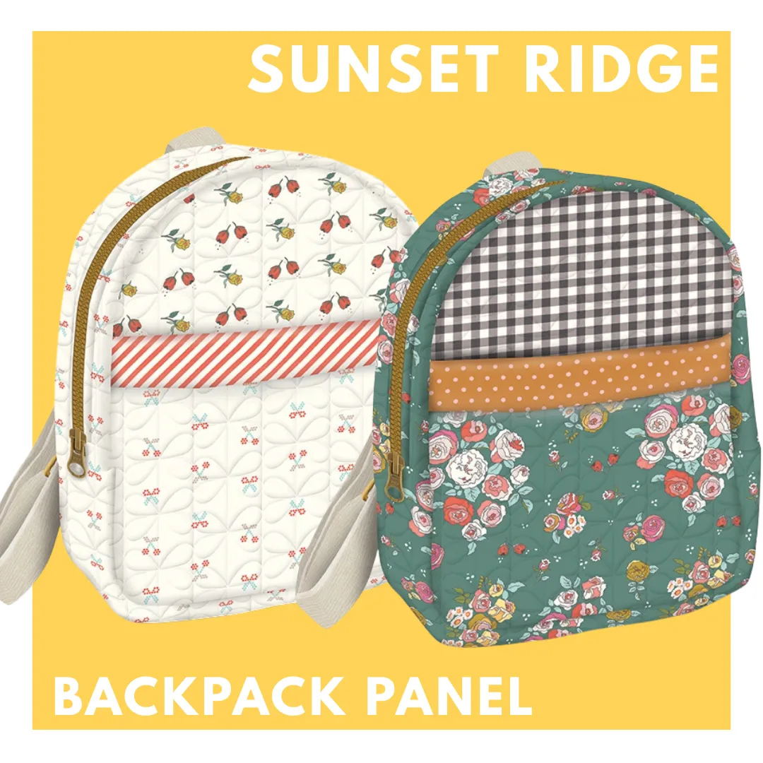 Colorful whimsical quilt with triangular circus tents, toys, and geometric shapes on a pink background bordered with colorful triangles and diamonds. No human shapes or faces.