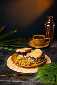 Ari tuna toast with gherkins on artisan bread served as a fresh all-day brunch sandwich at Lašė Lašė specialty coffee café in Ari, Bangkok.