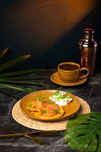 Salmon potato pancakes with smoked salmon, potato pancakes cooked in extra virgin olive oil, sour cream, and fresh dill served as an all-day brunch at Lašė Lašė specialty coffee café in Ari, Bangkok.