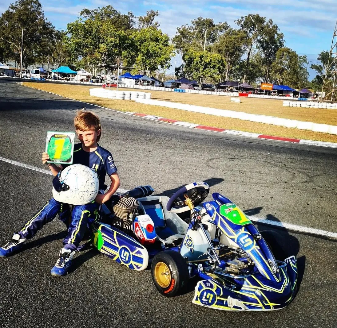 MG Engines with TKC — North Queensland Dealer. A professional racing kart engine with precision engineered components and MG branding, showing high performance design with no human shapes.